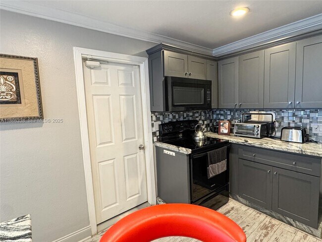 Building Photo - 161 NW 27th Ct