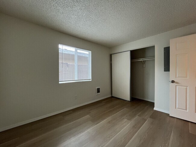 Building Photo - Inviting 2 Bedroom Home with Open Layout, Stainless Steel Appliances & Private Outdoor Retreat