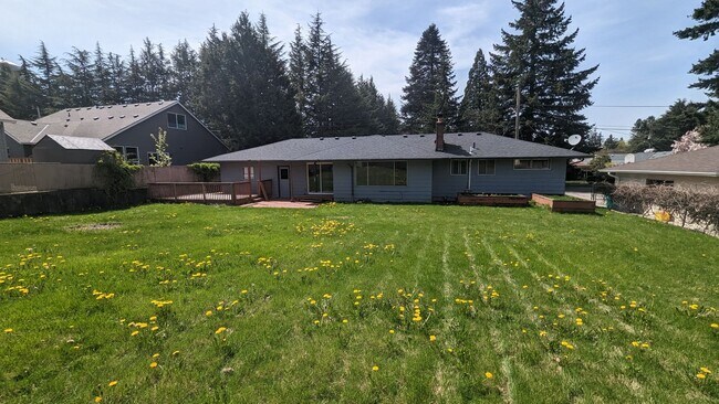 Building Photo - Spacious Three Bedroom with Large Backyard...