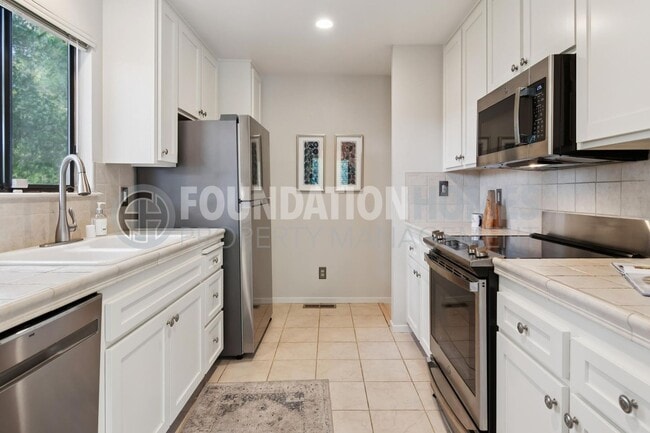 Building Photo - Tranquil Corte Madera Townhouse! DECK! 2 C...