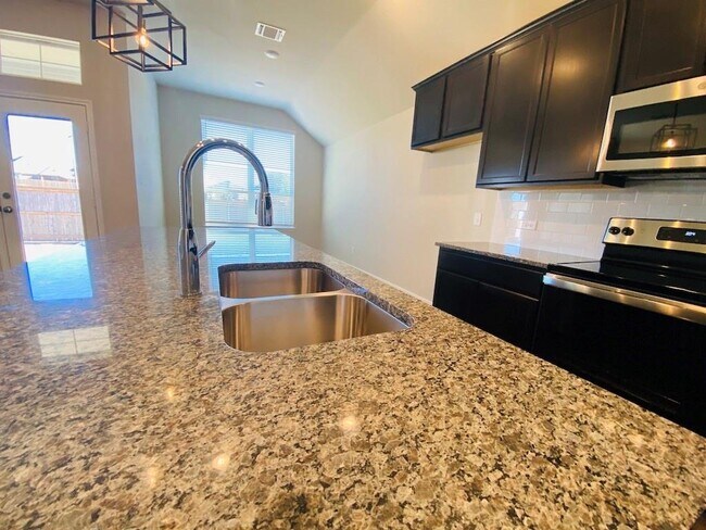 Building Photo - 5205 Leaning Tree