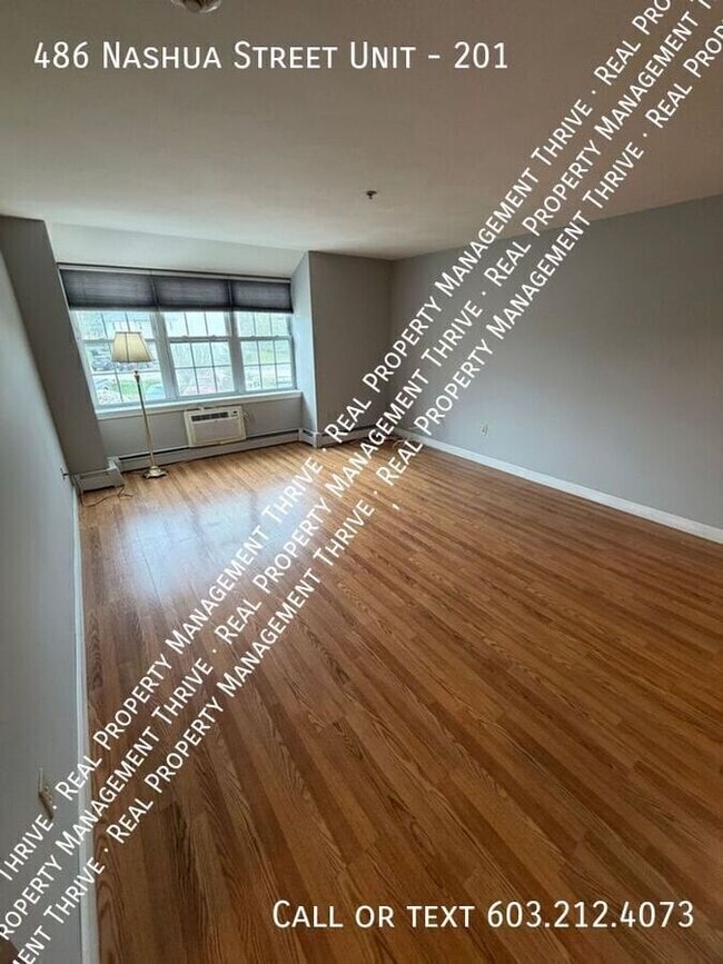 Building Photo - 486 Nashua St