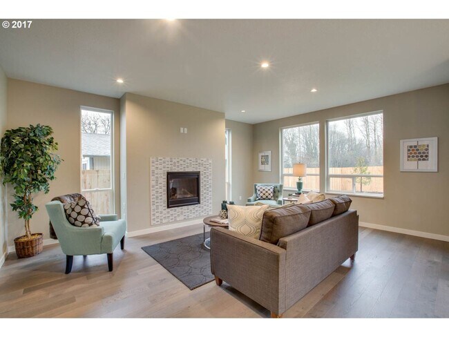 Building Photo - Charming 3BR Home with Fireplace, Bright Open Living Spaces & Loft