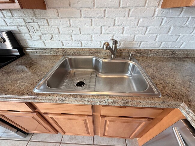 Building Photo - 4-Bed Home Near Clement Park with Entertainer’s Basement & Outdoor Oasis