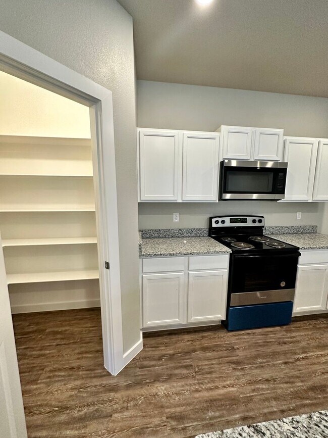 Building Photo - Available July 9th in Highly Desired Harve...