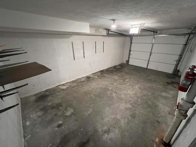 Building Photo - Bright & Spacious 3-Bedroom Duplex Unit on Large Corner Lot with Wood Floors & Garage!