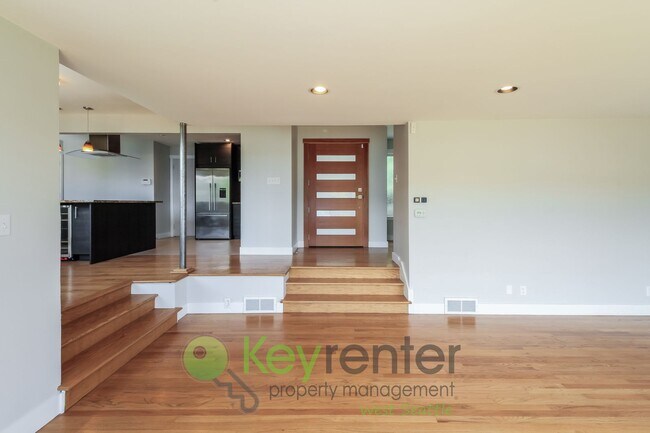 Building Photo - Waterfront Elegance with Private Dock and Designer Finishes