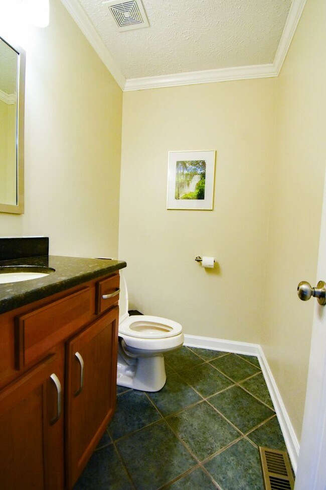 Building Photo - Coming Soon! 4 Bedroom 2.5 Bathroom With A Large Deck and 2 Car Garage! Near Methodist University