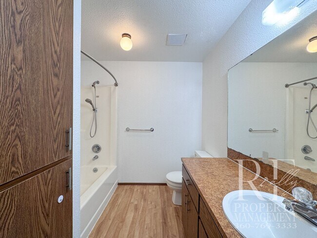Building Photo - Spacious Poulsbo Home with Large Basement, Fenced Yard & Garden Space