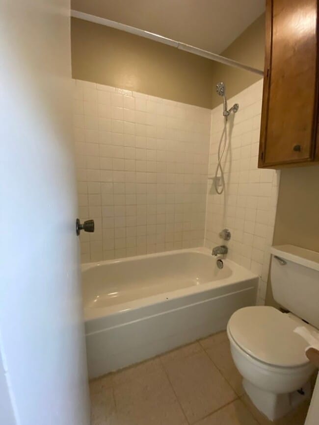 Building Photo - SPACIOUS & CUTE 2 bedroom 2 bath townhouse off Sunset Dr COMING SOON!