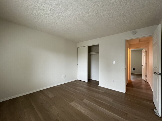 Building Photo - Inviting 2 Bedroom Home with Open Layout, Stainless Steel Appliances & Private Outdoor Retreat
