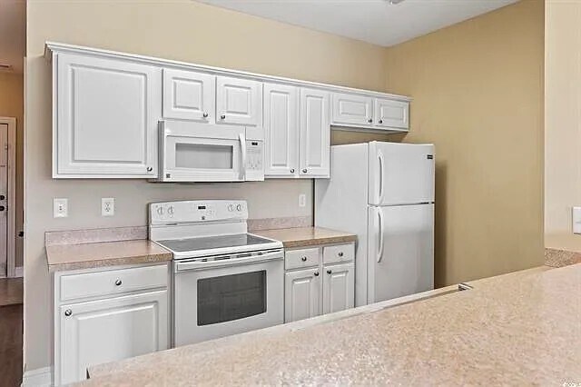 Building Photo - Coming Soon! Great Three Bedroom Condo in Myrtle Beach with Pool and Just 4 Miles to Beach!