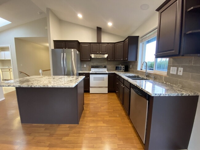 Building Photo - Spacious 4-bedroom with Panoramic Deck Nex...