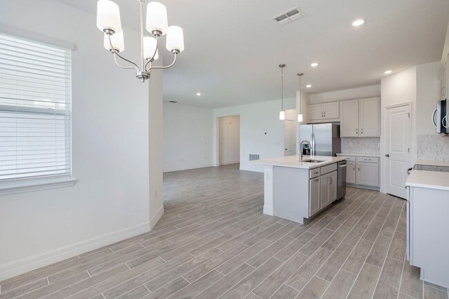 Building Photo - Beautiful Brand New Energy Efficient 4/2 C...