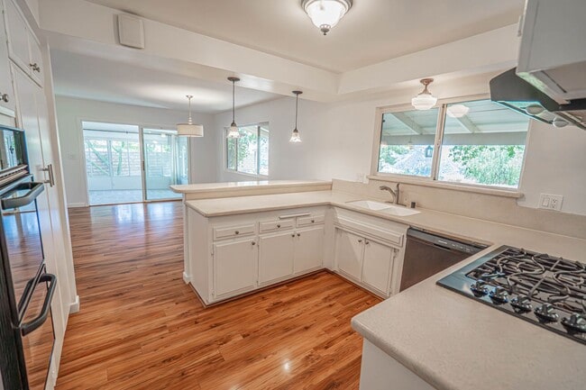 Building Photo - Spacious 4-Bedroom Home with Sun Room & Vi...