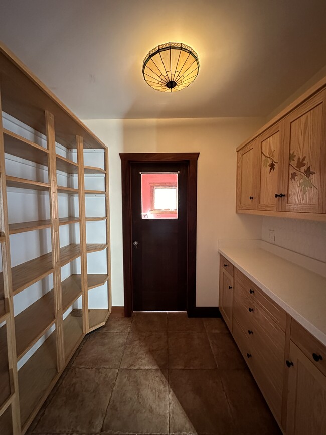 Pantry and entrance to Laundry Room - 5007 Raymond Pl