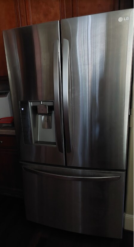 LG French Door Refrigerator - 11310 NW Kimble Ct