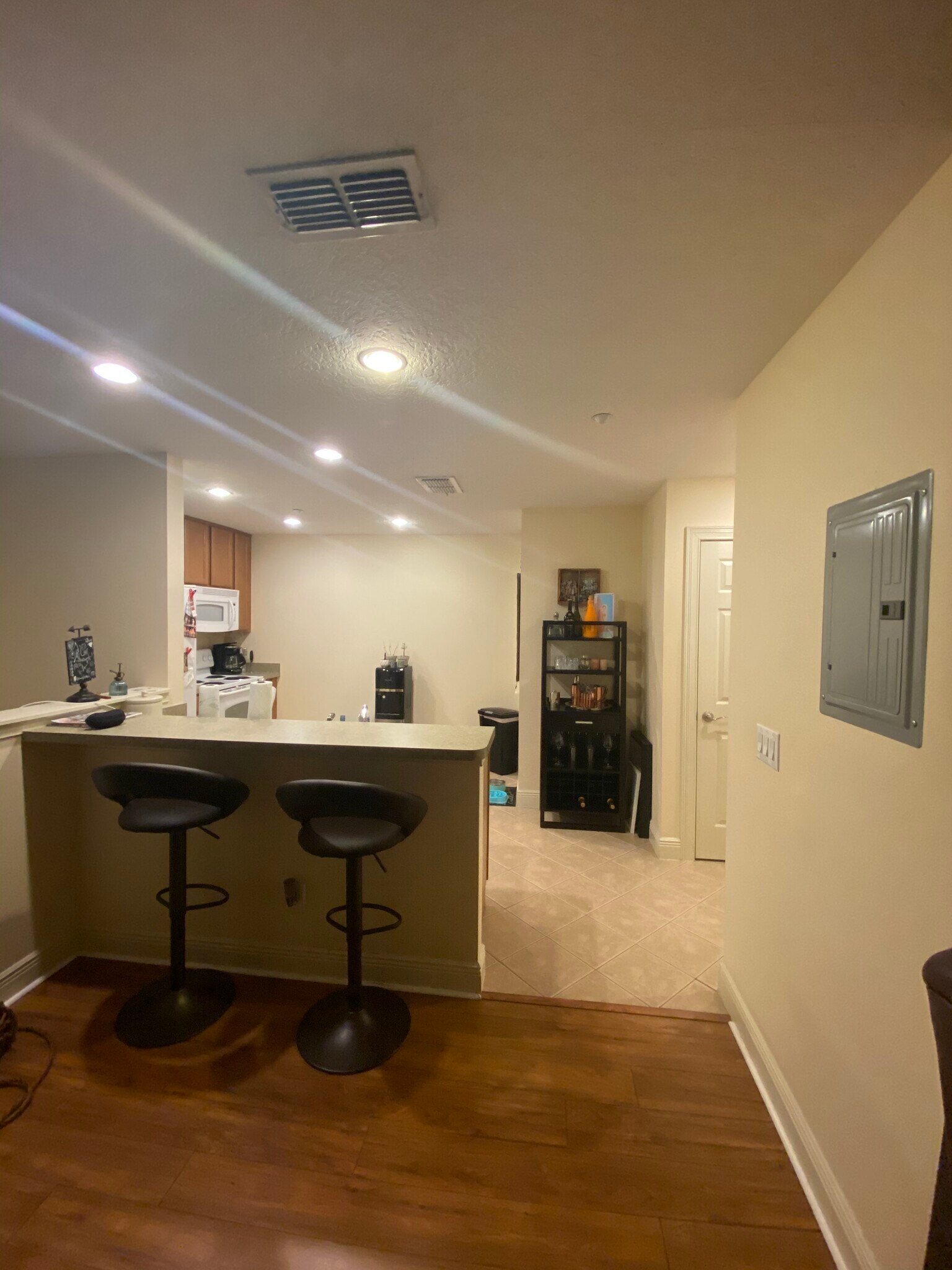 Dining room & high top stools at counter - 2892 Lincroft Ave
