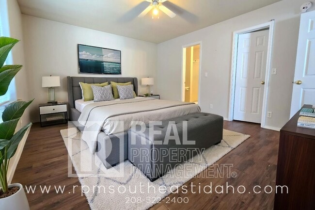 Building Photo - Spacious & Updated 2 Bedroom, 2 Bathroom Twin Home in Ammon with Garage, Fenced Backyard, and Hoo...