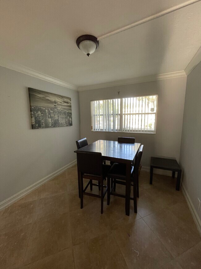 Building Photo - 6075 N Sabal Palm Blvd