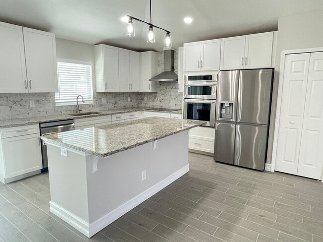 Building Photo - COMING SOON - 4/2.5/2  Home off of California Blvd.