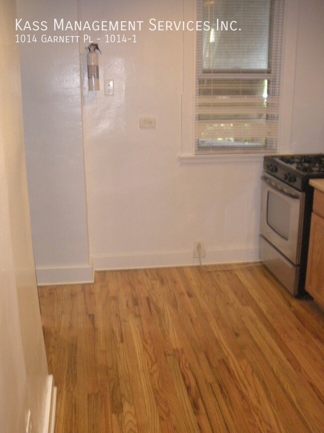 Building Photo - Very Spacious Duplex Apartment features 4 ...