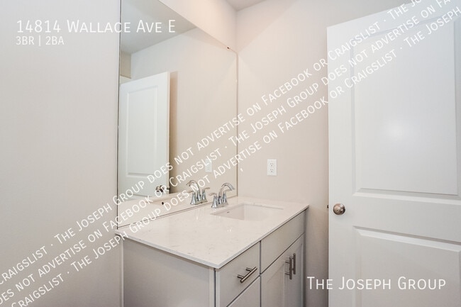Building Photo - 14814 Wallace Ave E