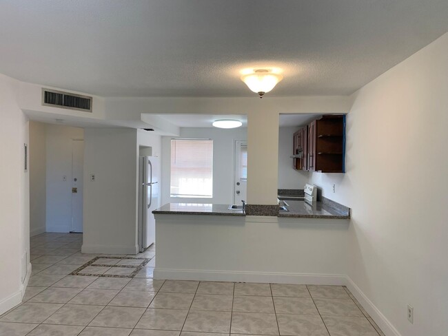 Building Photo - For Rent: Spacious One-Bedroom with Den in...