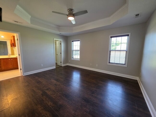 Building Photo - Spacious 4-Bedroom Bryan Farms Beauty with Bonus Suite, Large Fenced Yard & RV/Boat Parking!