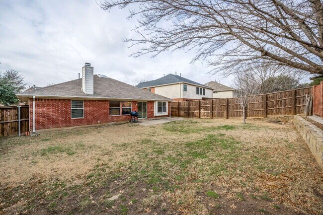 Building Photo - Modern Brick Home with Skylit Kitchen and Private Backyard
