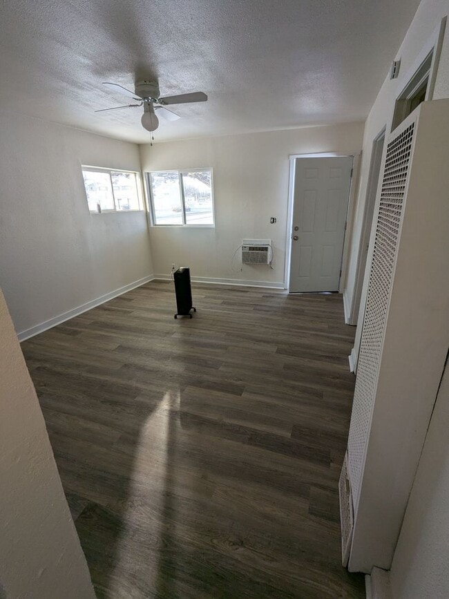 Building Photo - Ground Level 2 Bedroom, 2 Bath apartment. New flooring and paint. Tenant pays electric and natura...