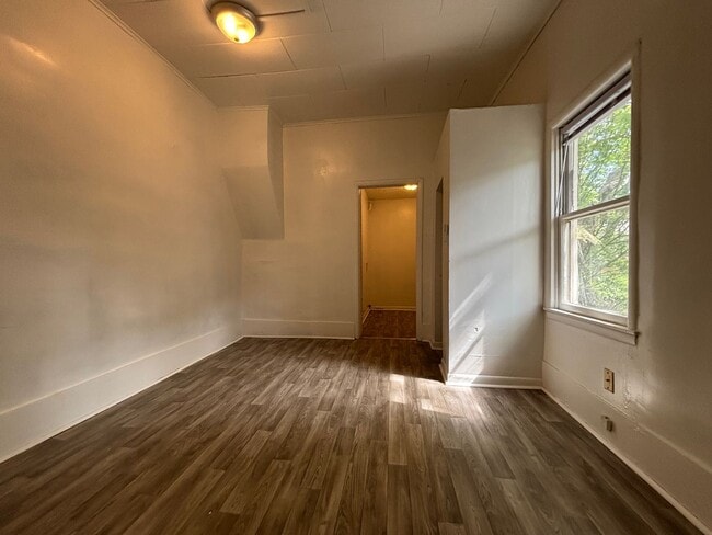 Building Photo - One Bedroom Duplex Available with Washer/Dryer Hookups