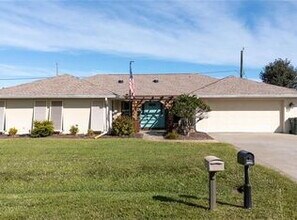 Building Photo - 5-Bedroom Pool Home with 2 Full Baths - Spacious 2373 Sq Ft Home in Englewood's Prime Location!"