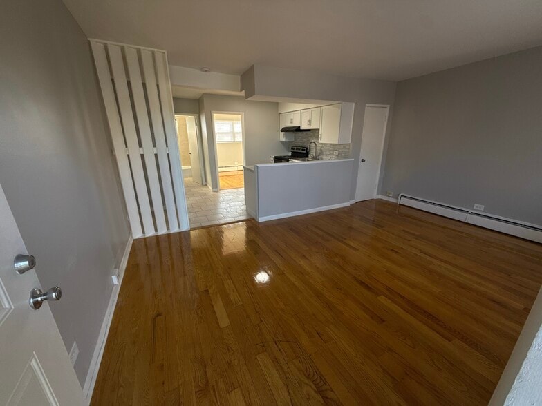 Living Room w/ Coat Closet + Full Apartment View - 1633 E 74th St