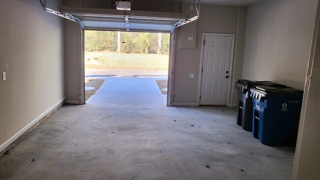 Garage with separate alarm monitored walk-in door - 1373 Bayrose Cir