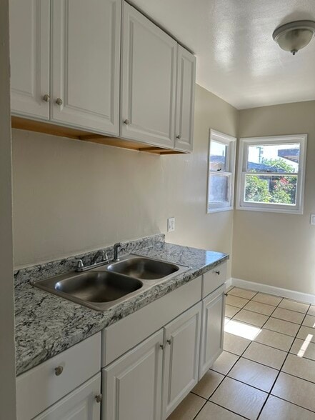 Kitchen with back door - 620 E Avon Pl