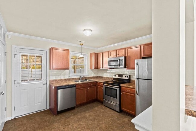 Building Photo - End Unit with Lots of Upgrades!