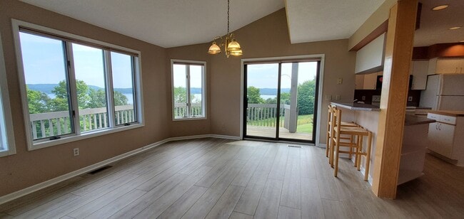 Building Photo - Lakefront End-Unit Condo with Crystal Lake...