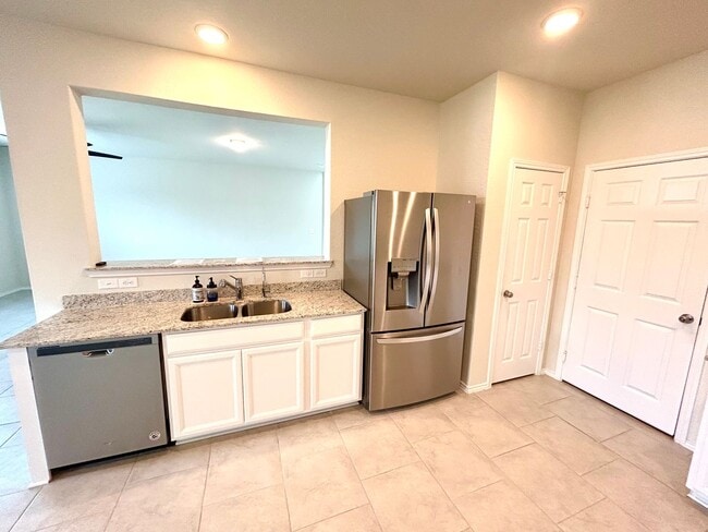 Building Photo - *COMING SOON* Sophisticated Two-Story Home with Versatile Loft Space!