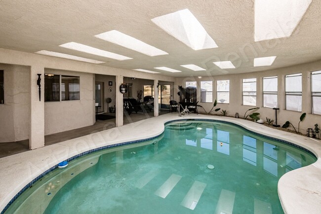 Building Photo - FURNISHED WITH INDOOR POOL