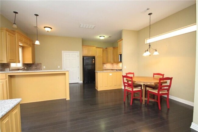 Building Photo - Available June 1st! 3-Bedroom, 2.5-Bathroom Home in Rupple Row