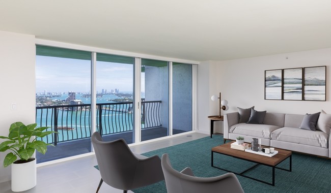 Premier living room boasting beautiful ocean views - Bay Parc Apartment Homes