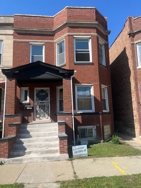 Building Photo - 6440 S Vernon Ave