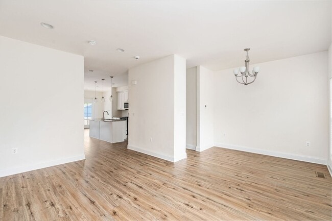 Building Photo - Your Next Home: Modern 3-Level Townhome with Garage, Deck & Huge Flex Space