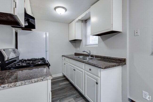 1BR, 1BA - 600SF - Kitchen - Powderhorn Park Apartments