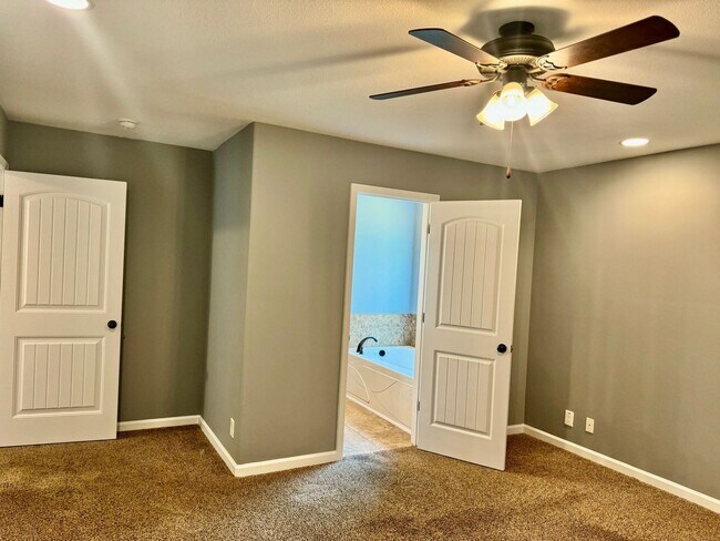 Building Photo - Large Open 4 Bedroom Home with Bonus! Tree Lined Backyard with Privacy Fence!