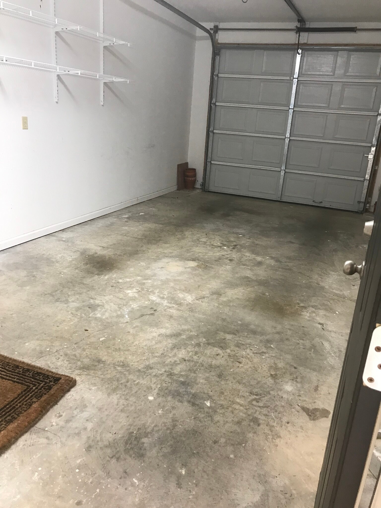 Enclosed garage with storage - 413 Halteria Ln
