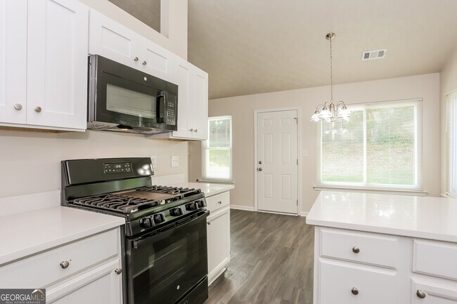 Building Photo - 5985 Green Meadow Way