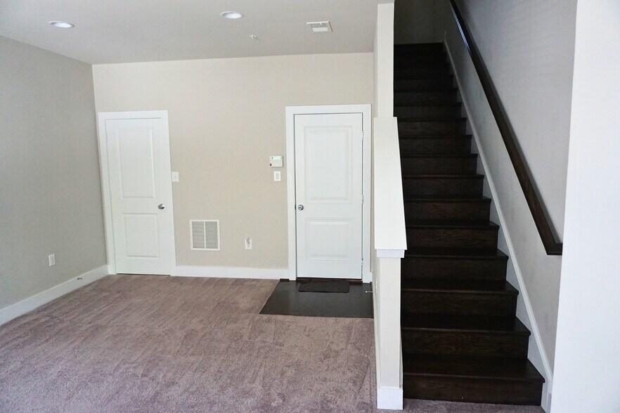 Ground floor, additional rec room or office space and access to attached garage - 1309 S Quinn St