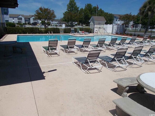 Building Photo - FIRST FLOOR, SURFSIDE BEACH THREE-BEDROOM CONDO, AVAILABLE SOON!!